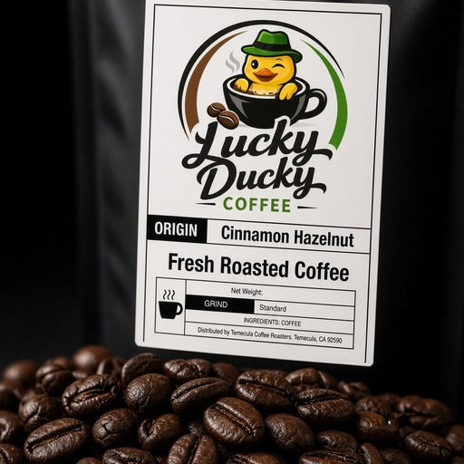 Close-up of Cinnamon Hazelnut flavored coffee and Lucky Ducky Coffee packaging