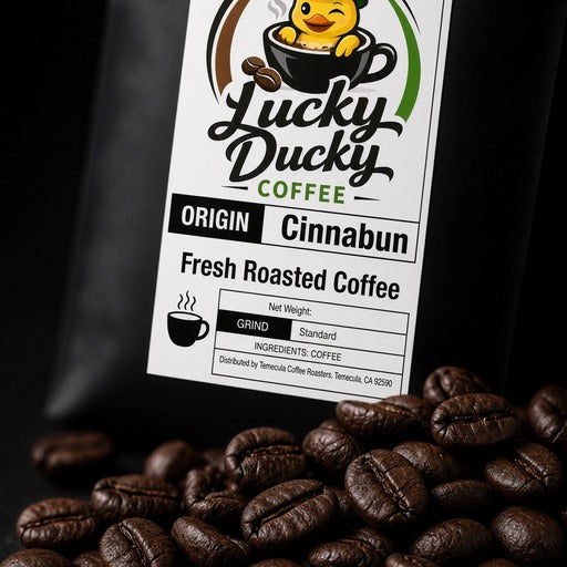 Close-up of Cinnabun flavored coffee and Lucky Ducky Coffee packaging